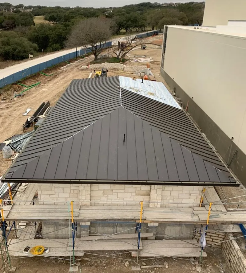 Metal roof new construction with scaffolding in Fayetteville