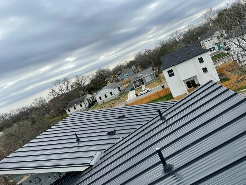 Standing seam metal roof panels with vents for Skylight Repair in Fayetteville